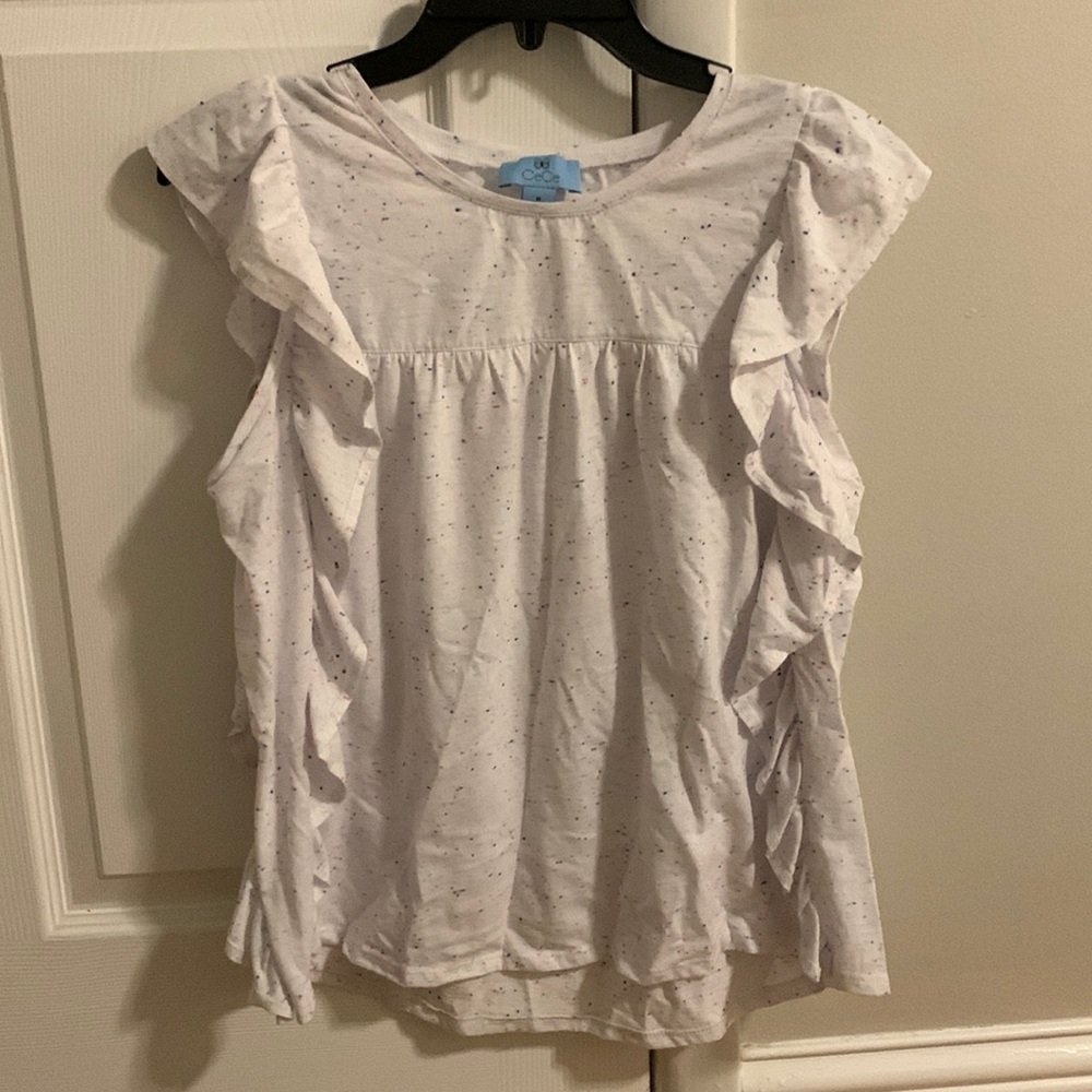 White sleeveless CeCe brand top.